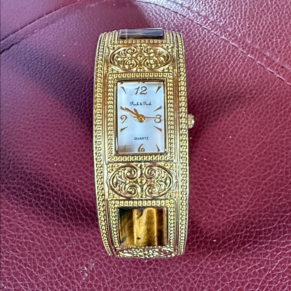 Gold Women's Watch with Intricate Design